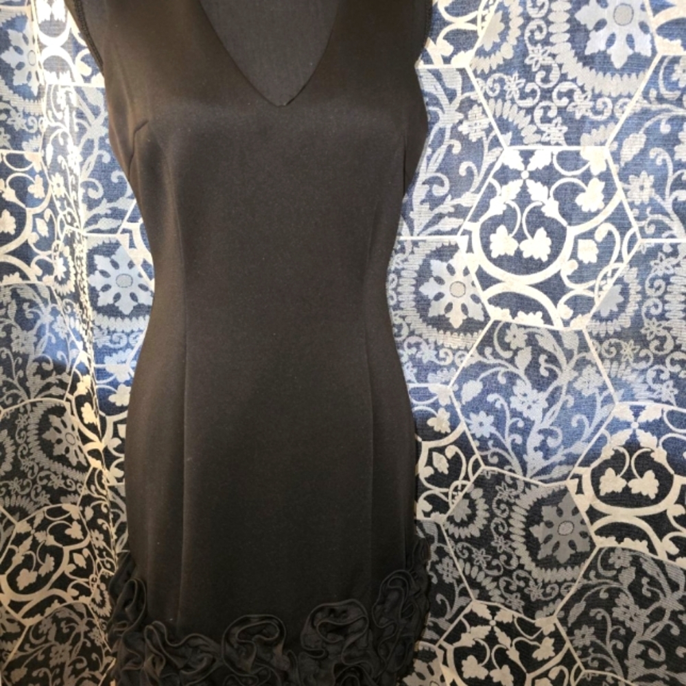 Black Donna Ricco mini dress with flower detail hem.size 6